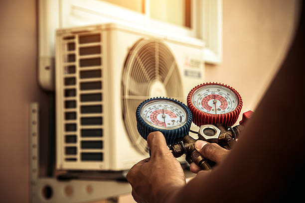 Professional Air Conditioning Service technician working in Newark, TX